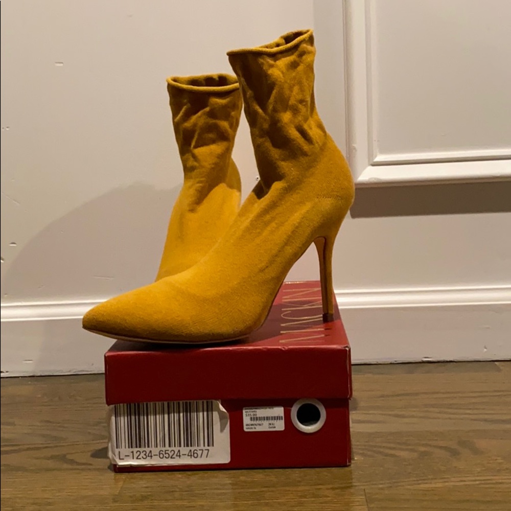 Brand NEW Booties in the color Mustard